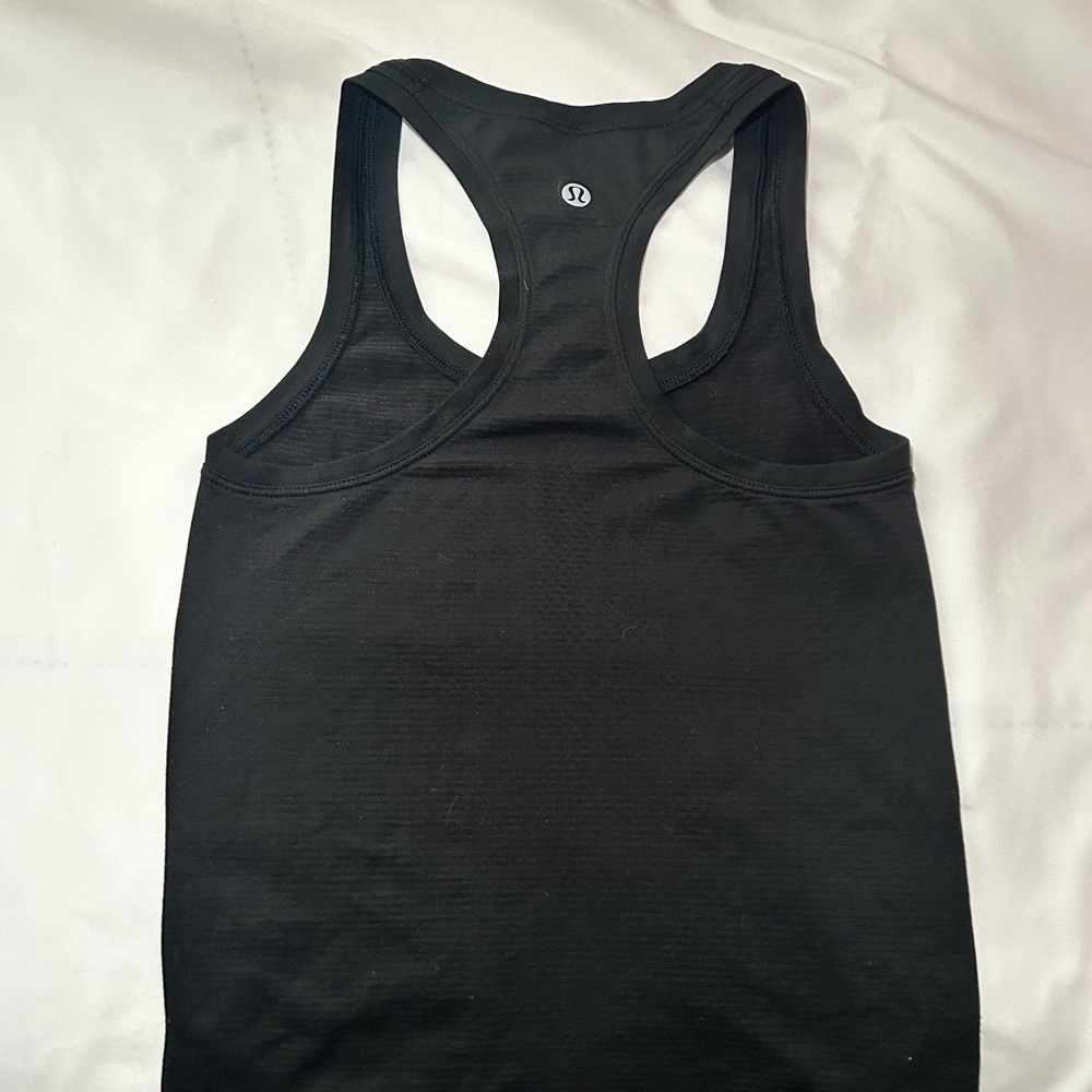 Black swiftly tech/ race length/ size: 0